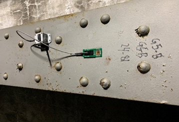 Wireless Strain gauge SenSpot™ at a Load Bearing Member of a Bridge