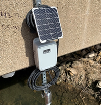 A water level meter at on the State Line Road Bridge over Piscasaw Creek