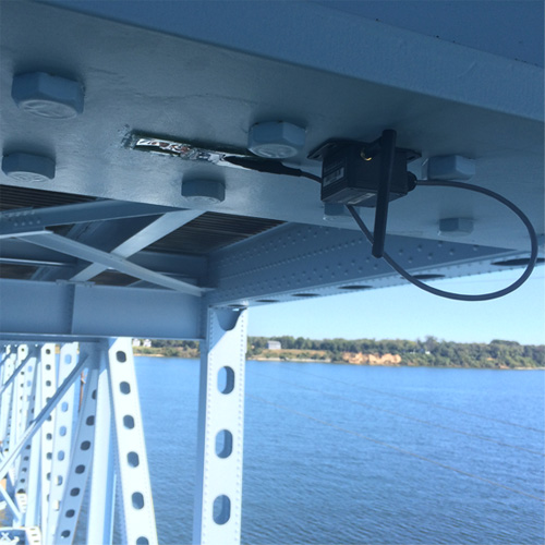 Wireless strain (stress) gauge SenSpot sensor installed on a bridge girder